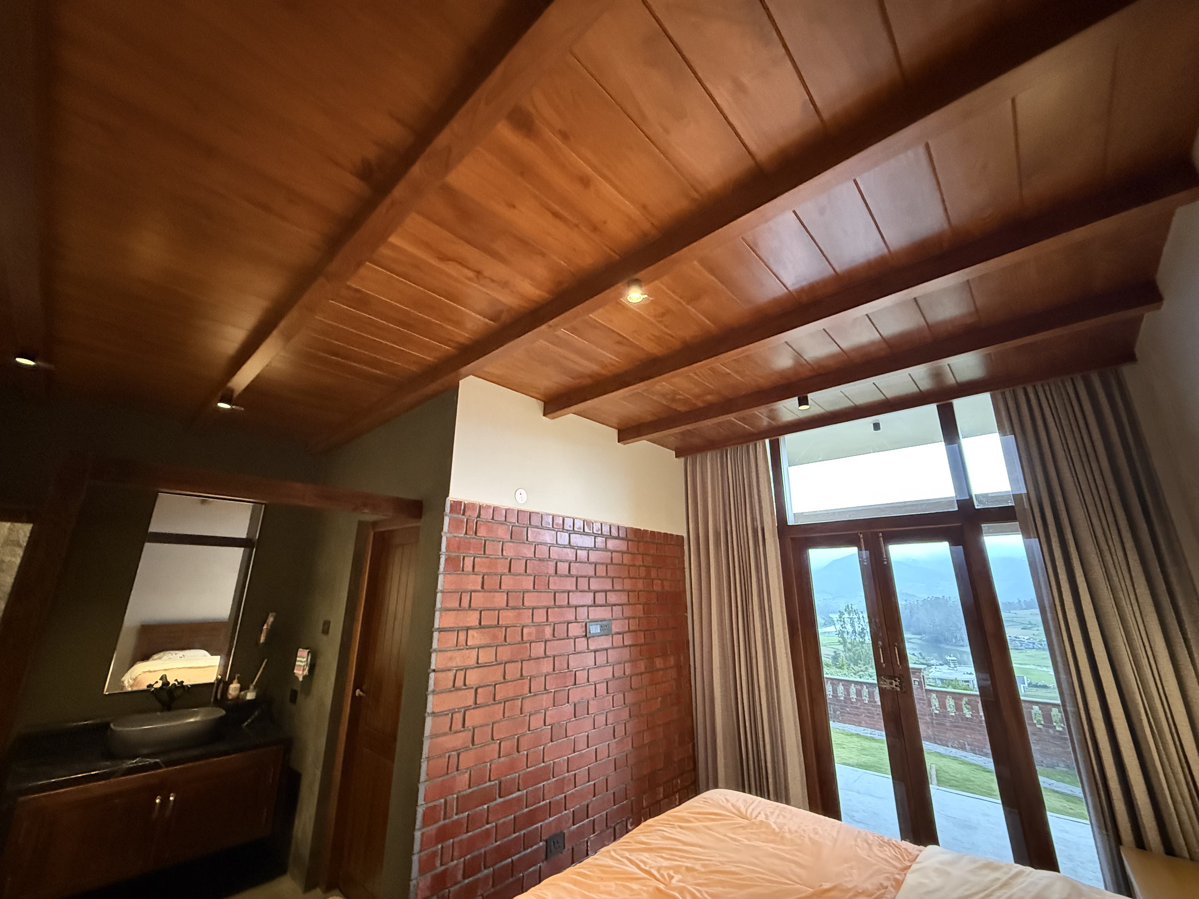 Contemporary wood-paneled bedroom