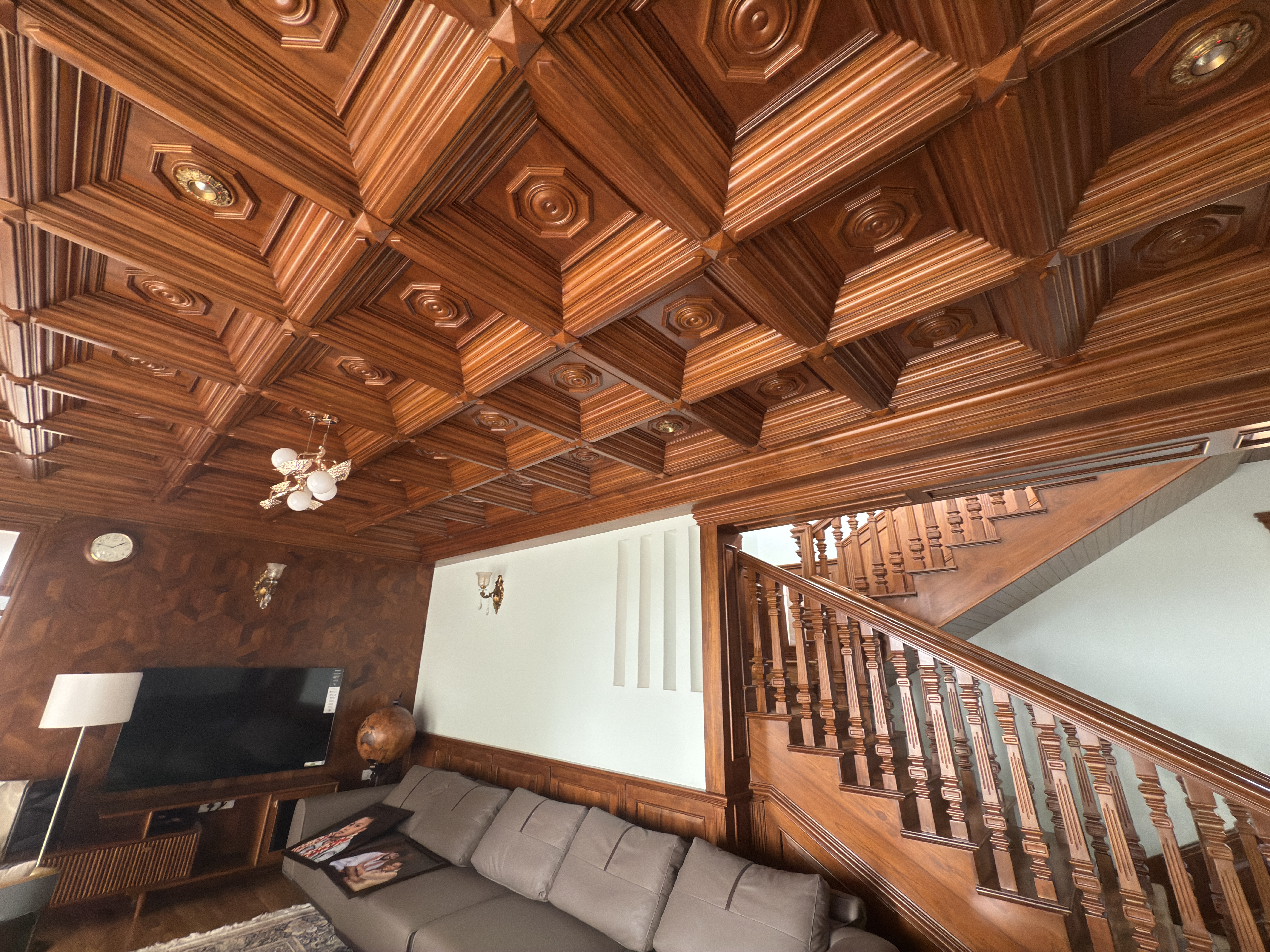Warm living room with coffered wooden ceiling
