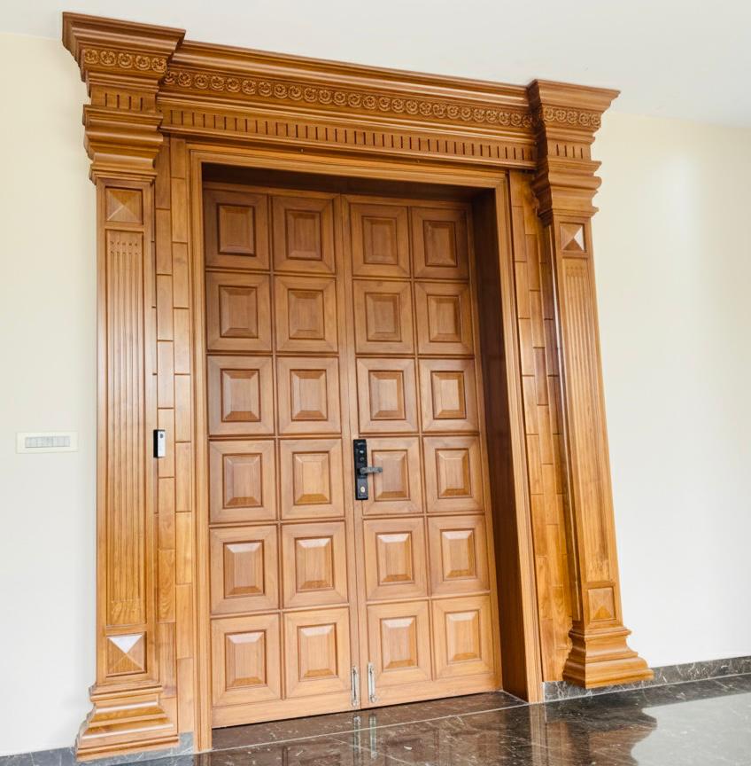Carved wooden double door
